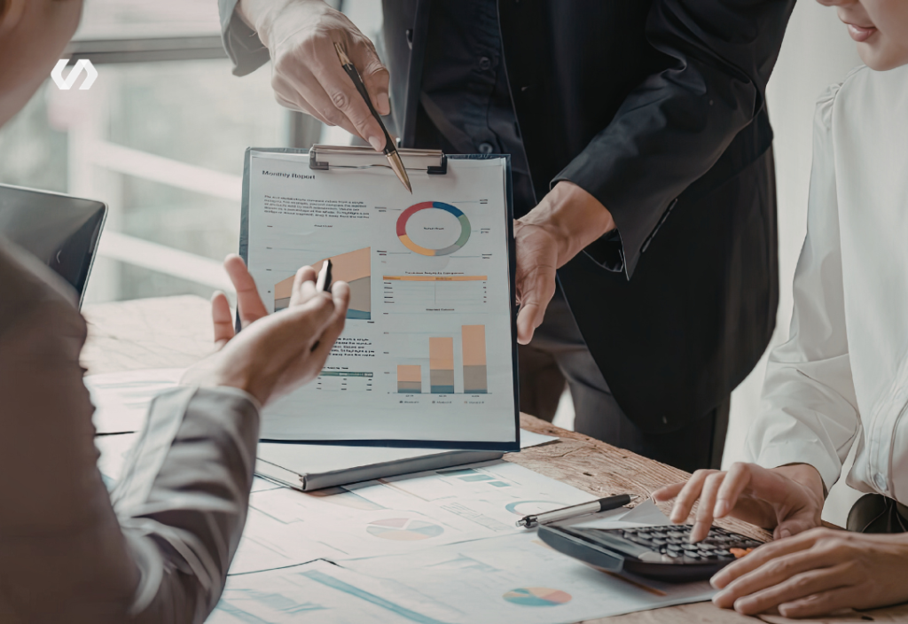 Team reviewing business performance report